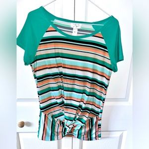 Just Be shirt medium in great used condition. It has multiple color patterns.